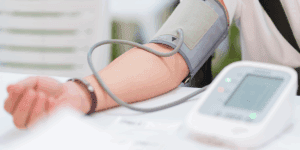 A woman having her blood pressure taken at at Health for Life Naturopathic Medicine in Phoenix, AZ
