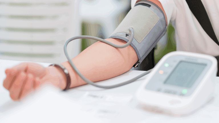 A woman having her blood pressure taken at at Health for Life Naturopathic Medicine in Phoenix, AZ