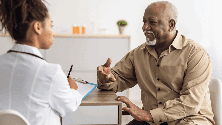 A man talking to a naturopathic doctor about how to treat gallstones naturally at Health for Life Naturopathic Medicine in Phoenix, AZ