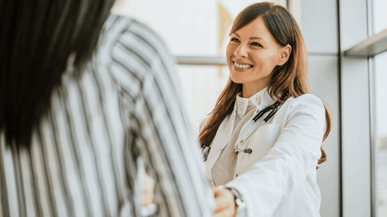 Doctor educating a patient about natural methods for managing thyroid disorders at Naturopathic Medicine in Phoenix, AZ