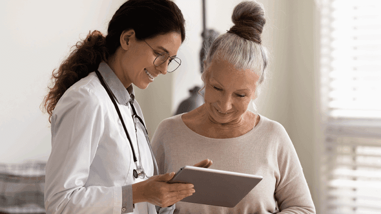 Menopausal woman talking to a naturopathic doctor in Phoenix and Scottsdale at Health For Life Naturopathic Medicine.