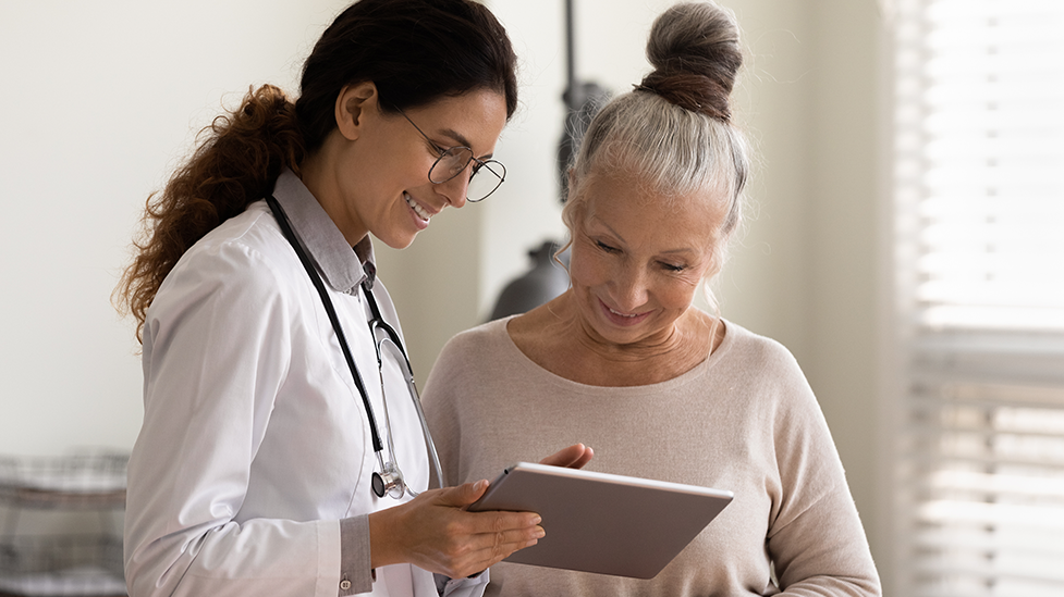 Menopausal woman talking to a naturopathic doctor in Phoenix and Scottsdale at Health For Life Naturopathic Medicine.