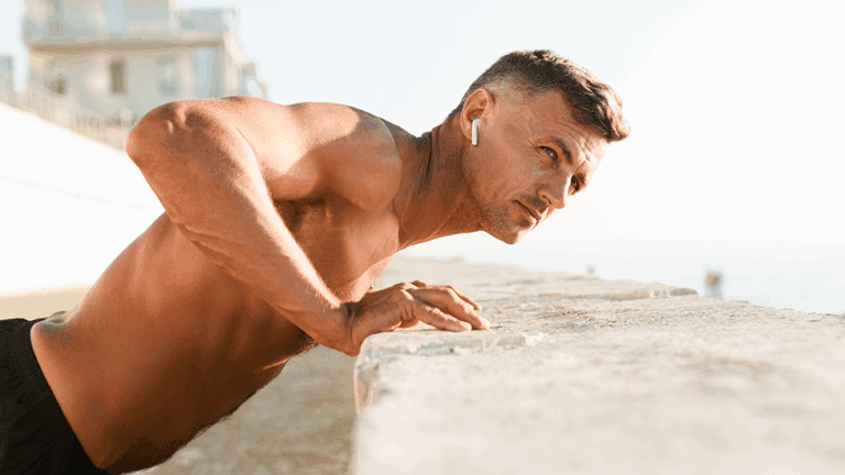 A physically fit man exercising outdoors following his longevity plan created by naturopathic doctors at Health For Life Naturopathic Medicine.