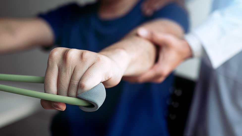 A person receiving physical therapy services at Health for Life Naturopathic Medicine