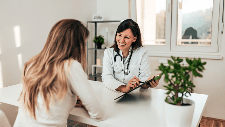 Naturopathic doctor reviewing lab results with patient in Scottsdale clinic