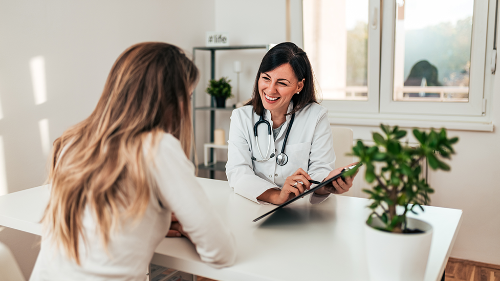 Naturopathic doctor reviewing lab results with patient in Scottsdale clinic