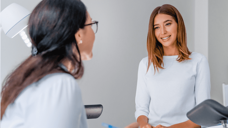 Naturopathic doctor consulting with a patient about sermorelin therapy and natural growth hormone support at a clinic in Scottsdale Arizona.