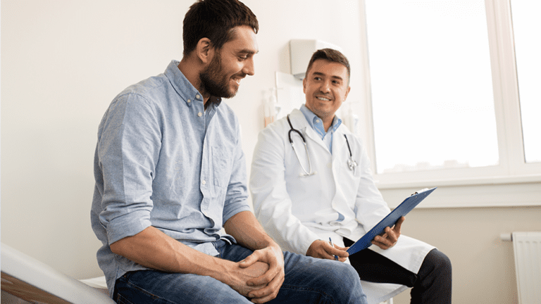 Naturopathic doctor discussing BPC-157 peptide therapy for gut health and recovery and regenerative health options with a patient in Scottsdale Arizona.