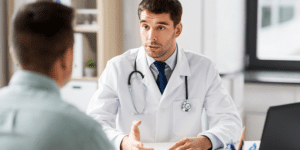 Naturopathic doctor discussing TB-500 peptide therapy and recovery support with a patient in Scottsdale, Arizona.